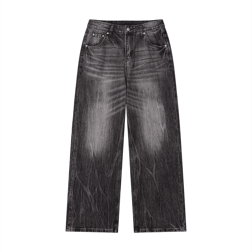 Wide-leg black jeans with a faded effect and subtle whiskering on the thighs.