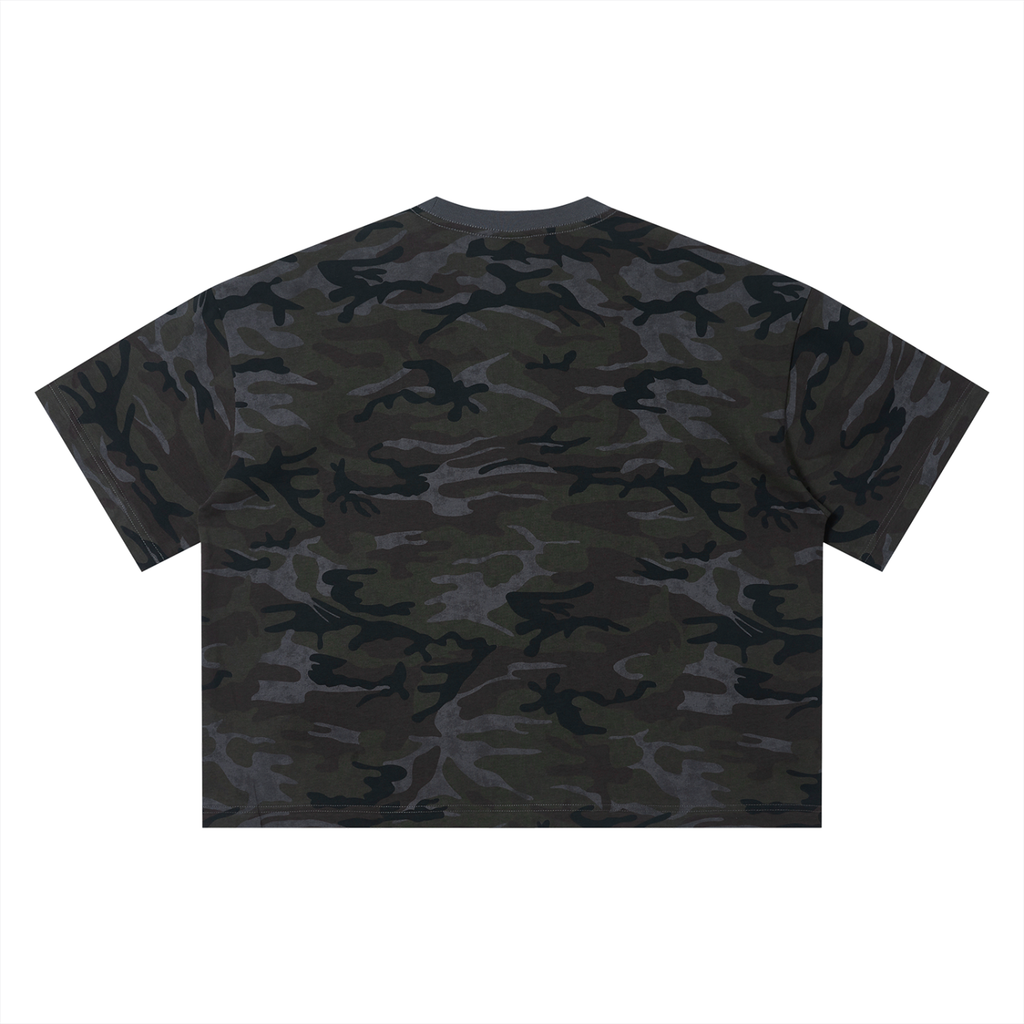 Camouflage T-shirt with dark green, brown, and black patterns against a white background.