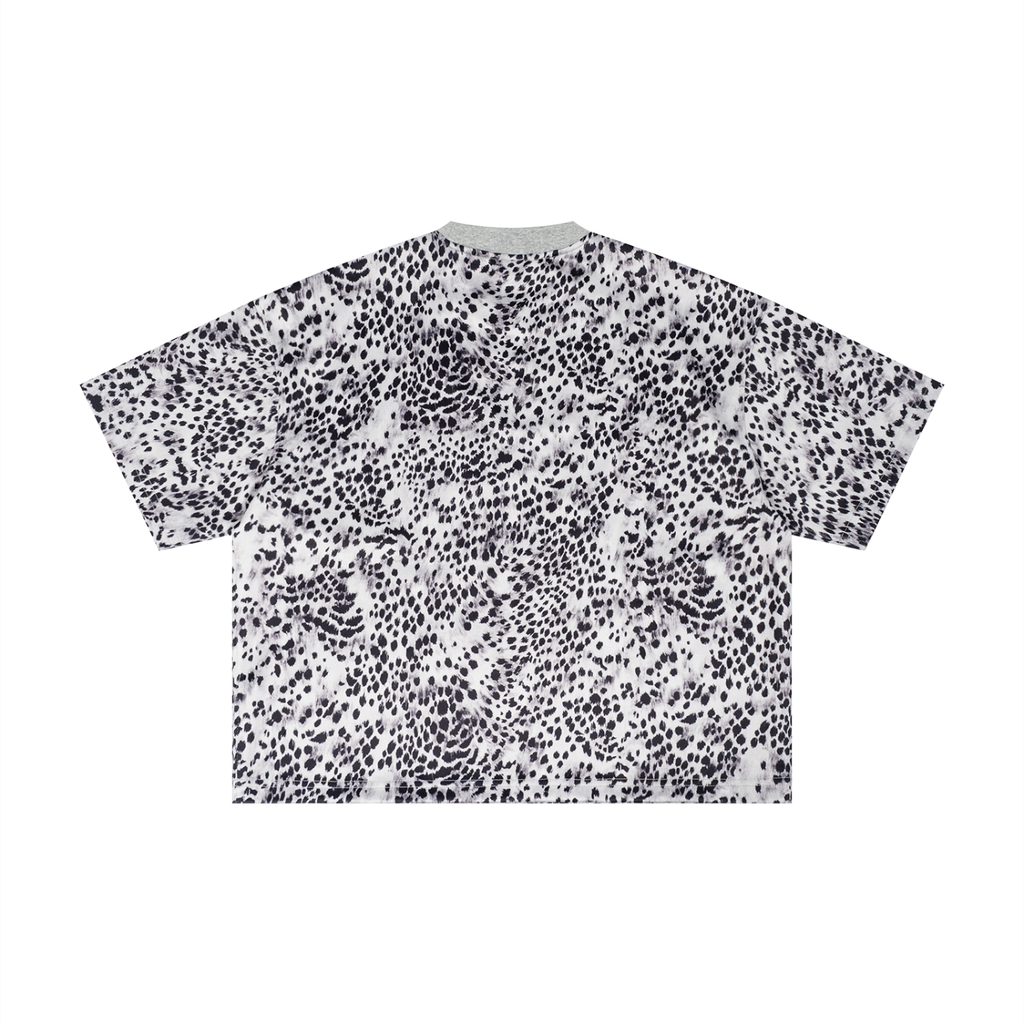 White T-shirt with a black dotted pattern, short sleeves, and a light gray collar.