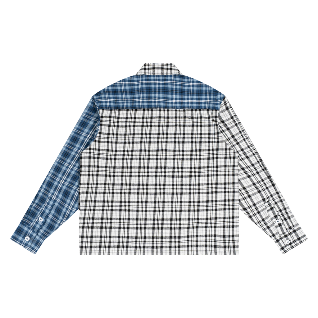 Back view of a plaid shirt with a blue and black left side, white and black right side, and blue yoke.