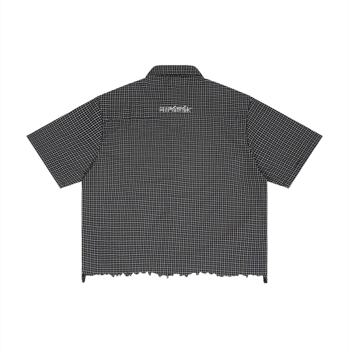 Checkered black shirt with short sleeves, frayed hem, and white text on the back.