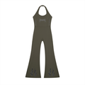 Olive green halter jumpsuit with flared legs and subtle black flame patterns at the hem.