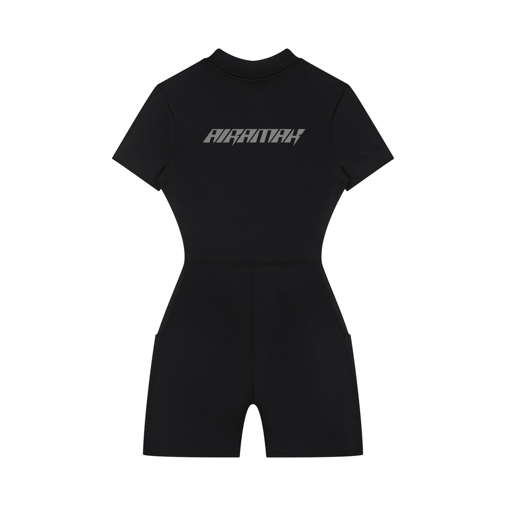 Black short-sleeve romper with "AIRARIAH" text on chest, featuring a fitted waist and high neckline.