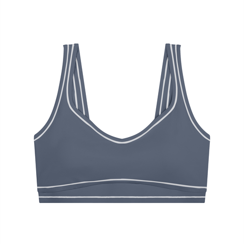 Gray sports bra with double straps and white trim accents.