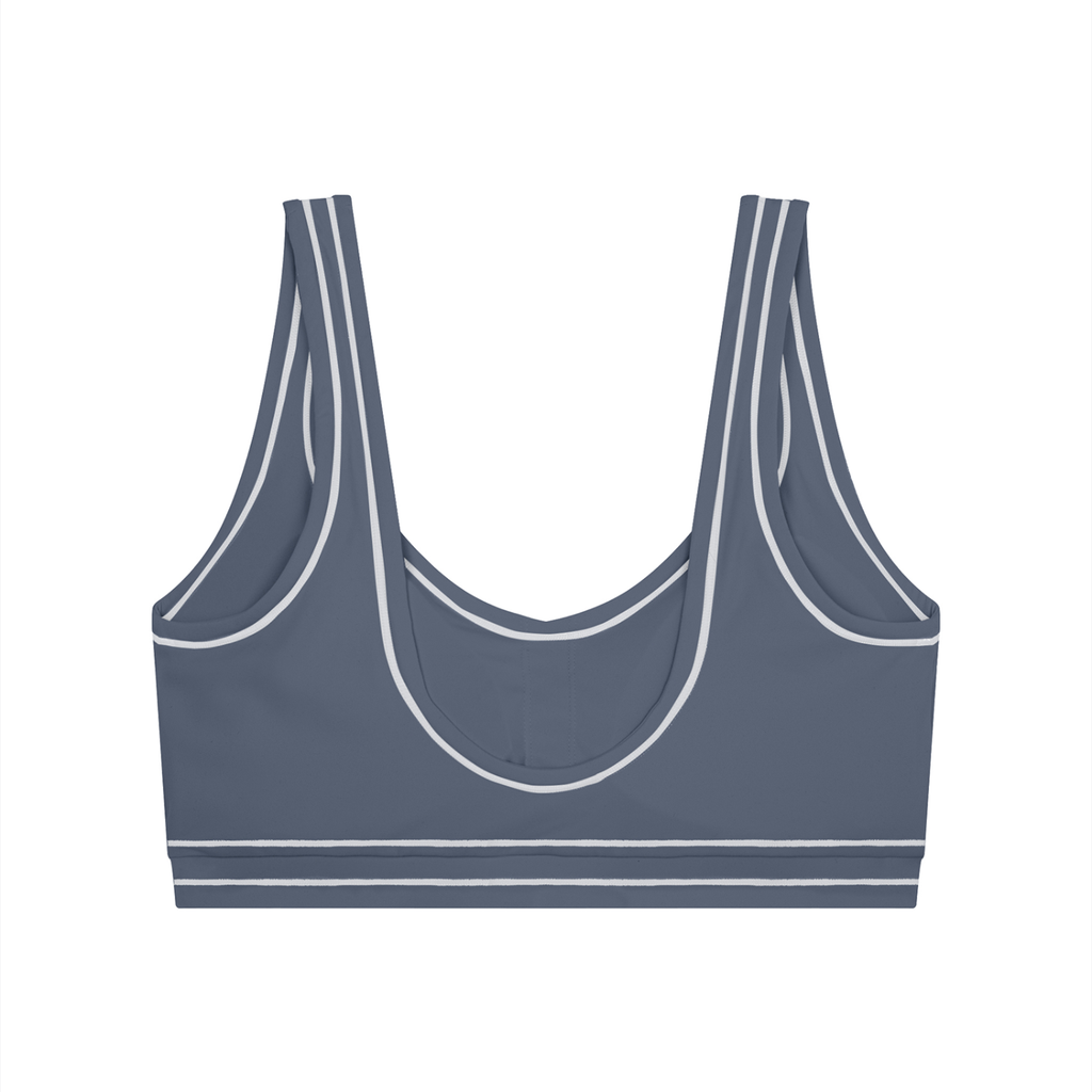 Dark gray sports bra with white trim, wide straps, and a scoop neck design.