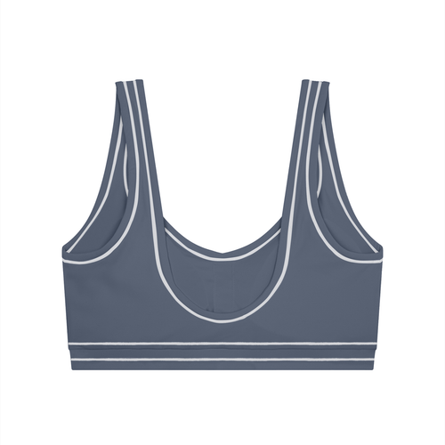 Dark gray sports bra with white trim, wide straps, and a scoop neck design.