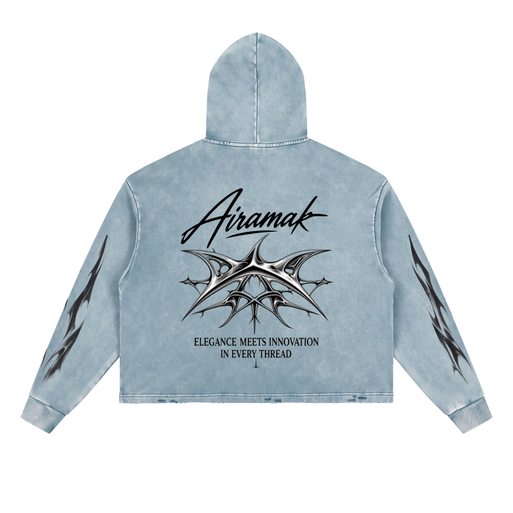 Light blue denim hoodie with black tribal designs and text on back, and sleeves.