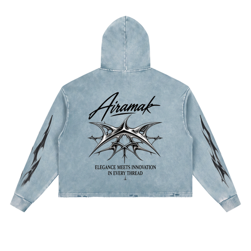 Light blue denim hoodie with black tribal designs and text on back, and sleeves.