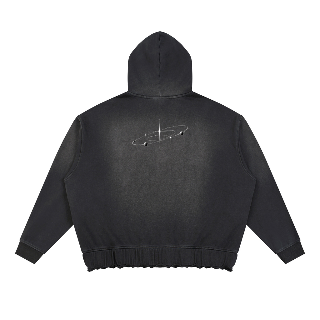 Black hoodie with sparkling, ringed planet design on the back, and ribbed cuffs and hem.