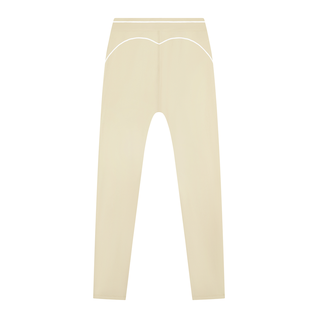 Beige pants with white piping on the back, featuring a heart-shaped seam.