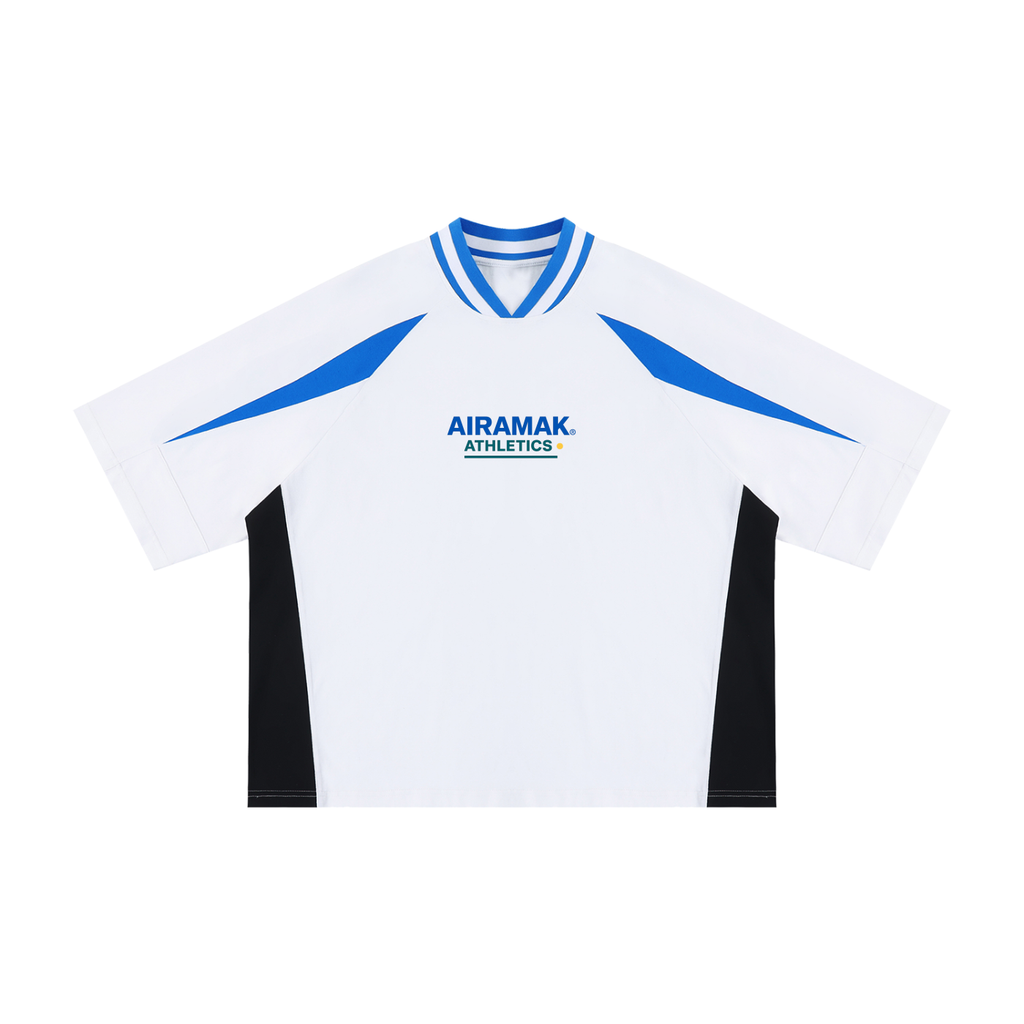 White sports jersey with blue trim, blue accents, and black side panels. "AIRAMAK ATHLETIC" text.
