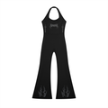 Black halter jumpsuit with flame designs on flared legs and cross accents on the chest.