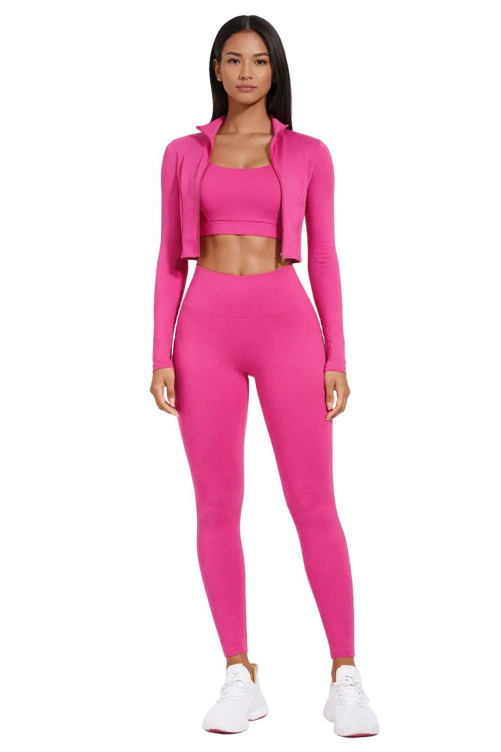 Woman in bright pink athletic wear and white sneakers standing against a plain background.