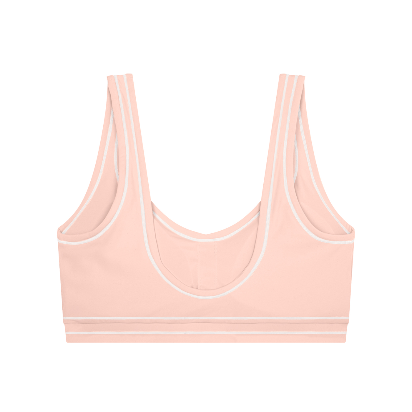 Peach-colored sports bra with white trim, double straps, and a scoop neckline.