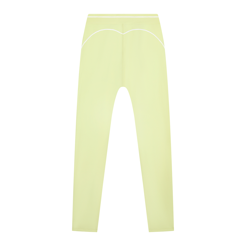 Light yellow high-waisted pants with white piping details and a seamless front design.