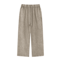 Beige wide-legged pants with an elastic waistband and drawstring ties.
