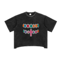 Black T-shirt with colorful gem designs and a central pink cross on the front.