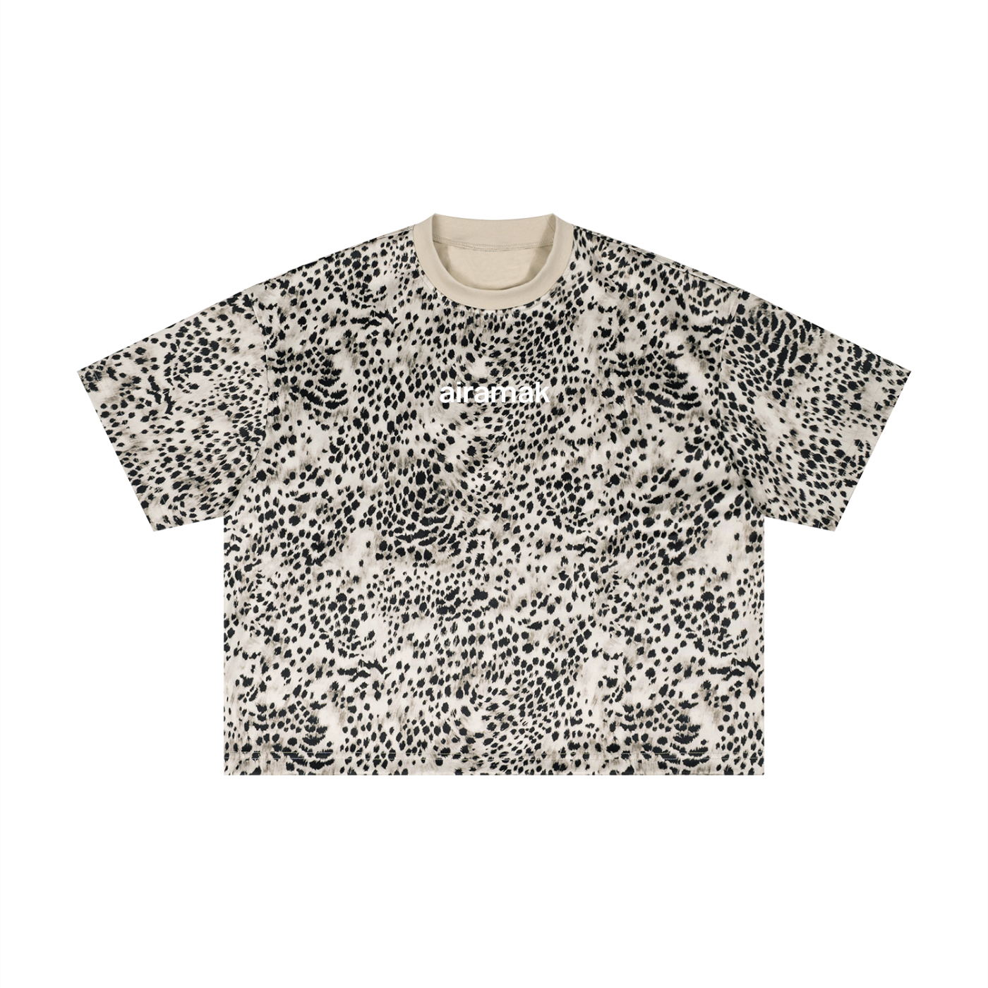 Beige T-shirt with black abstract spots and a round neck.