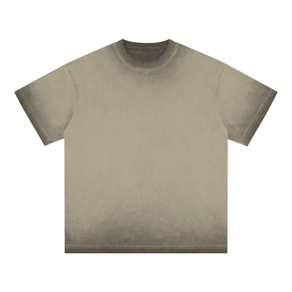 Beige T-shirt with a faded, worn texture and short sleeves, displayed against a white background.