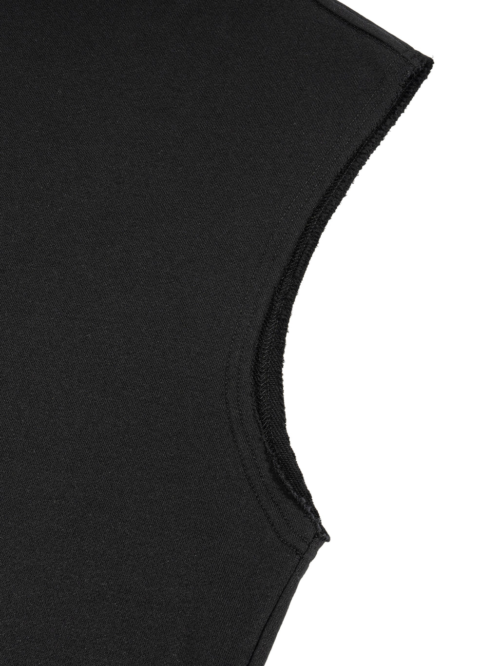 Close-up of a black sleeveless garment with visible stitching on the armhole.