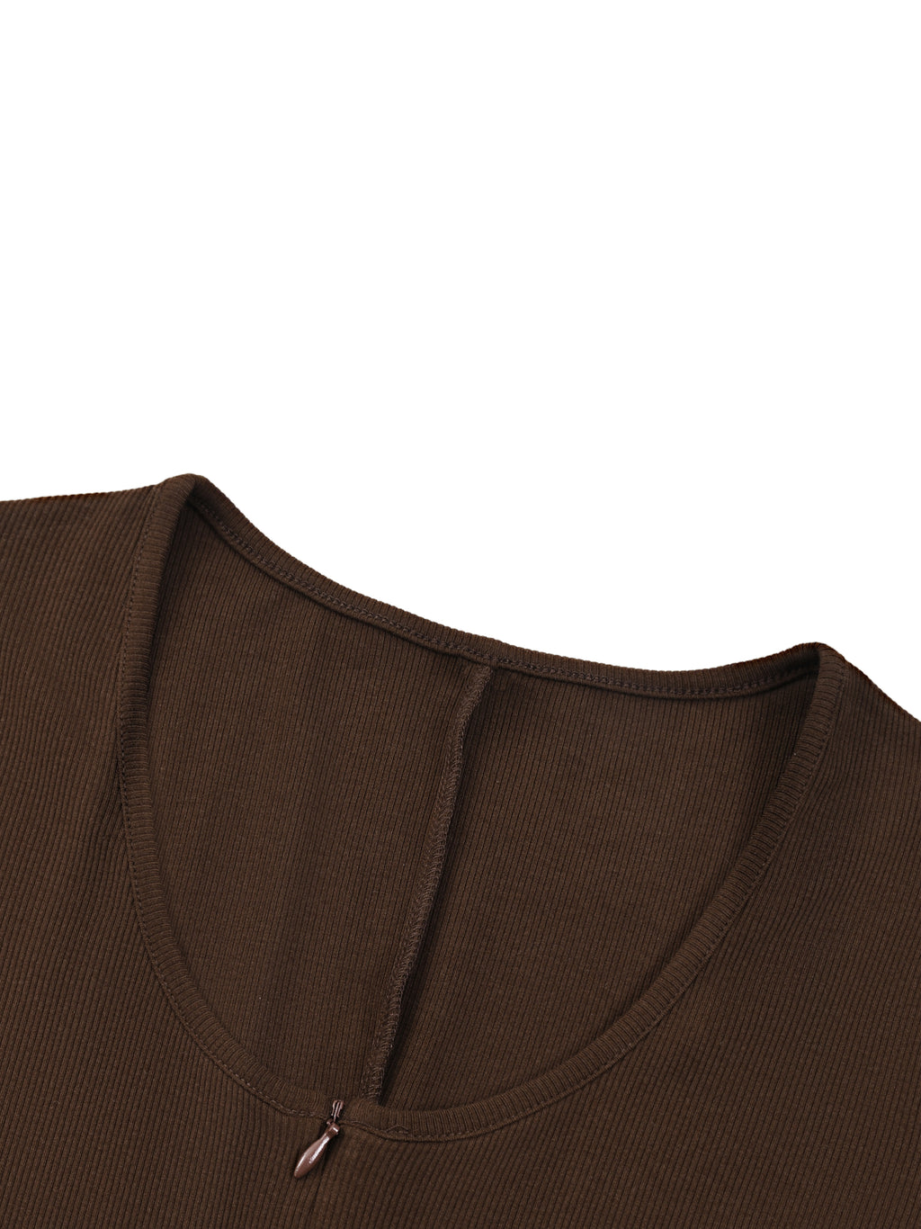 Close-up of a dark brown shirt's neckline with a visible seam and a small zipper pull.