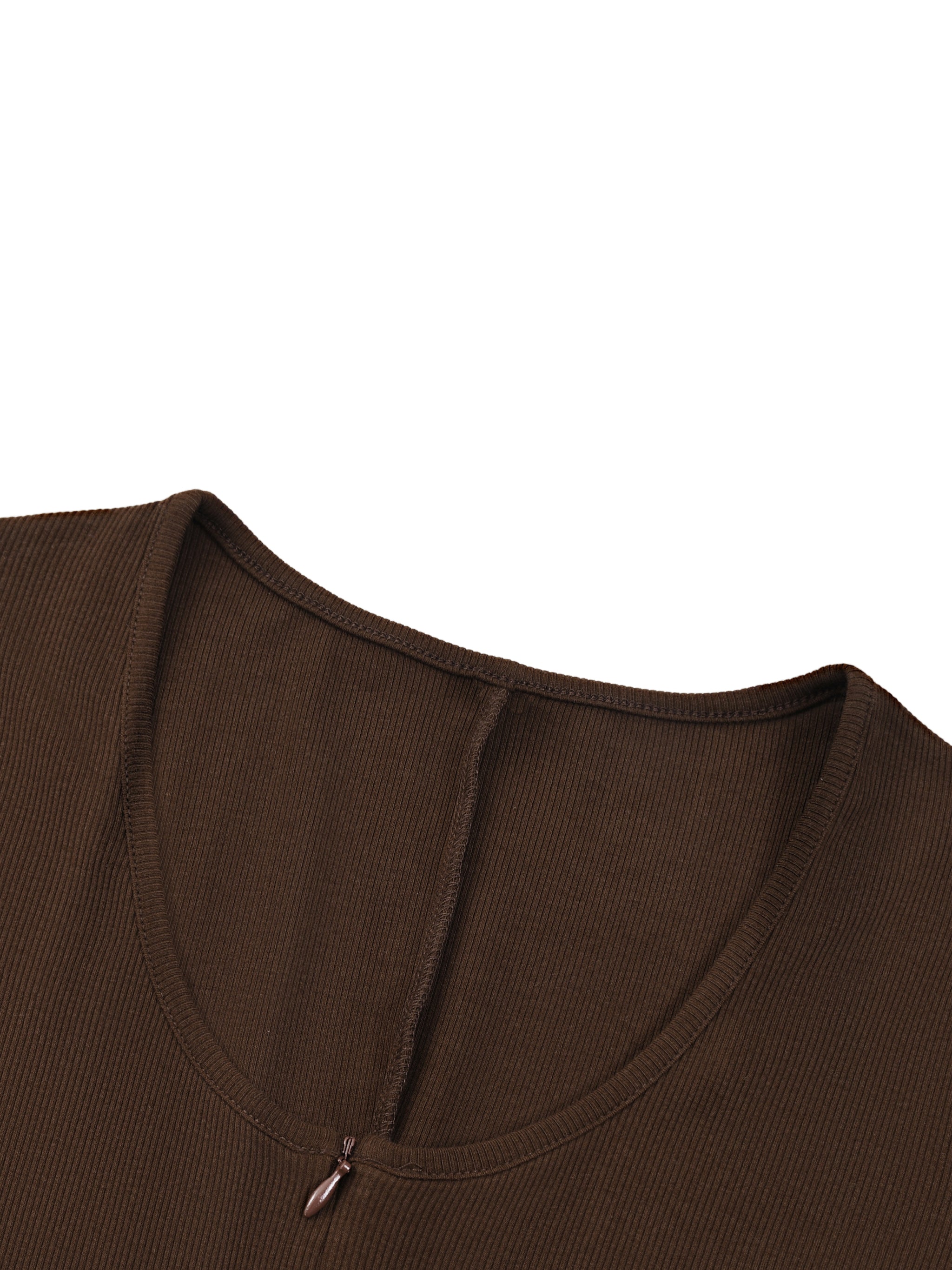 Close-up of a dark brown shirt's neckline with a visible seam and a small zipper pull.