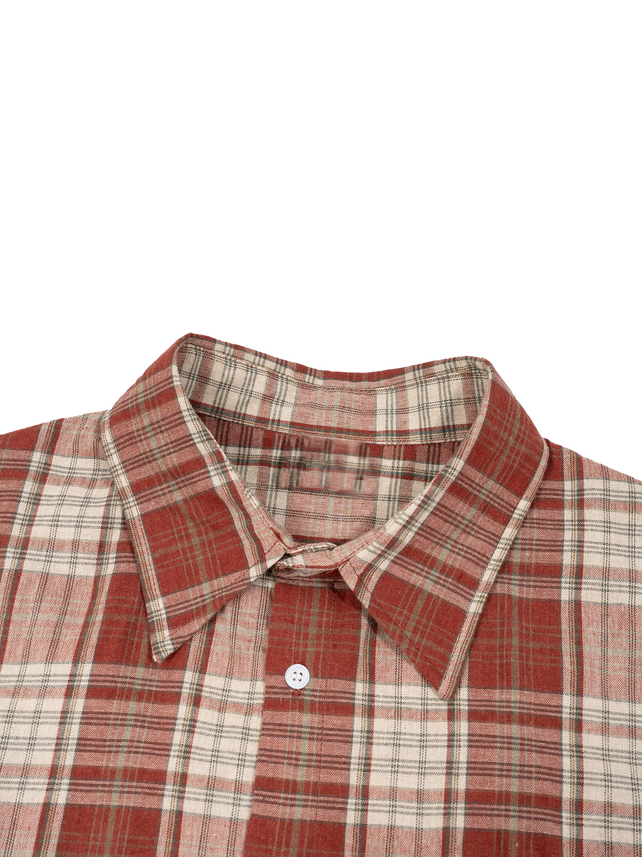Red and beige plaid shirt with a pointed collar and white buttons.