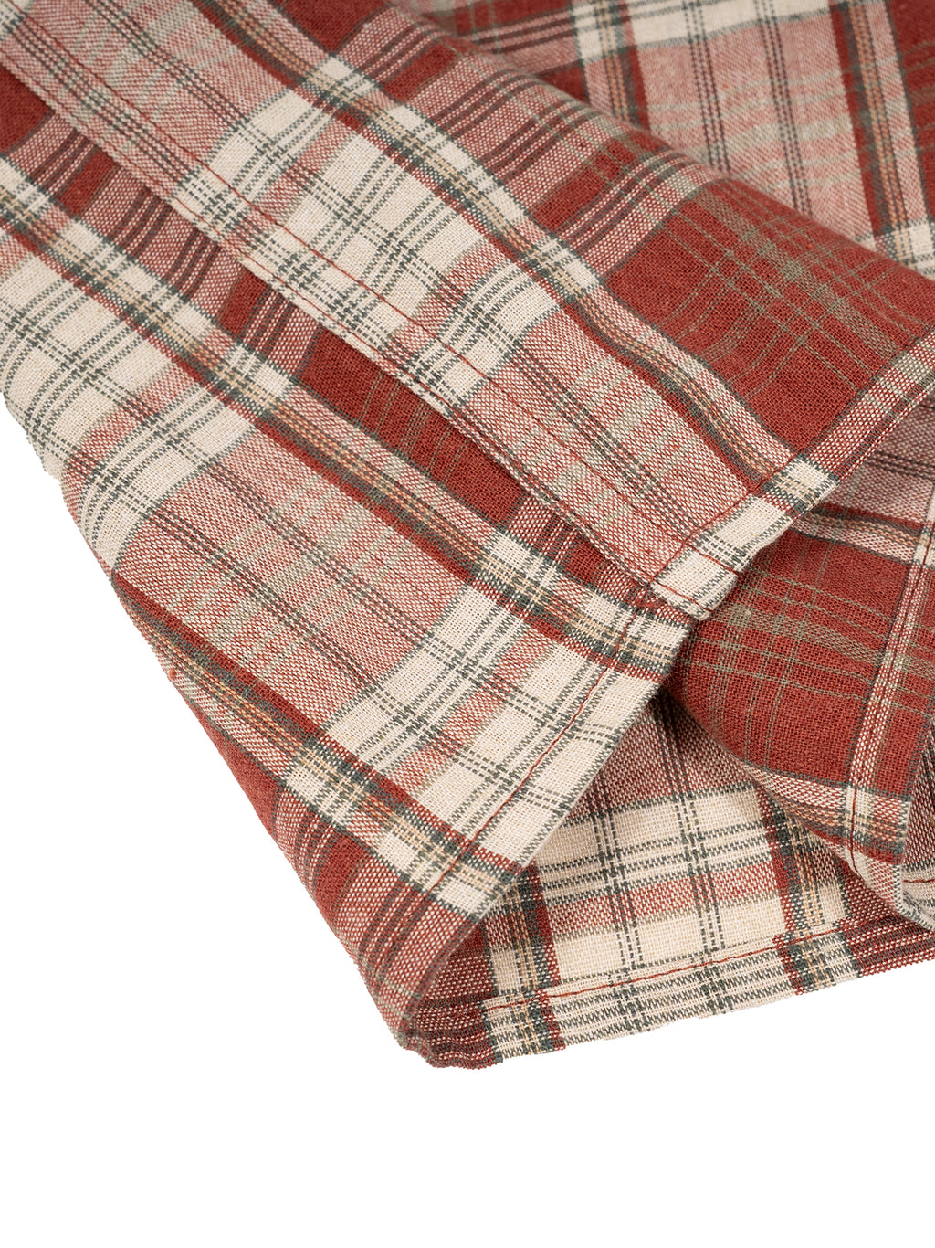 Red and white plaid fabric with intersecting lines and folded edges.