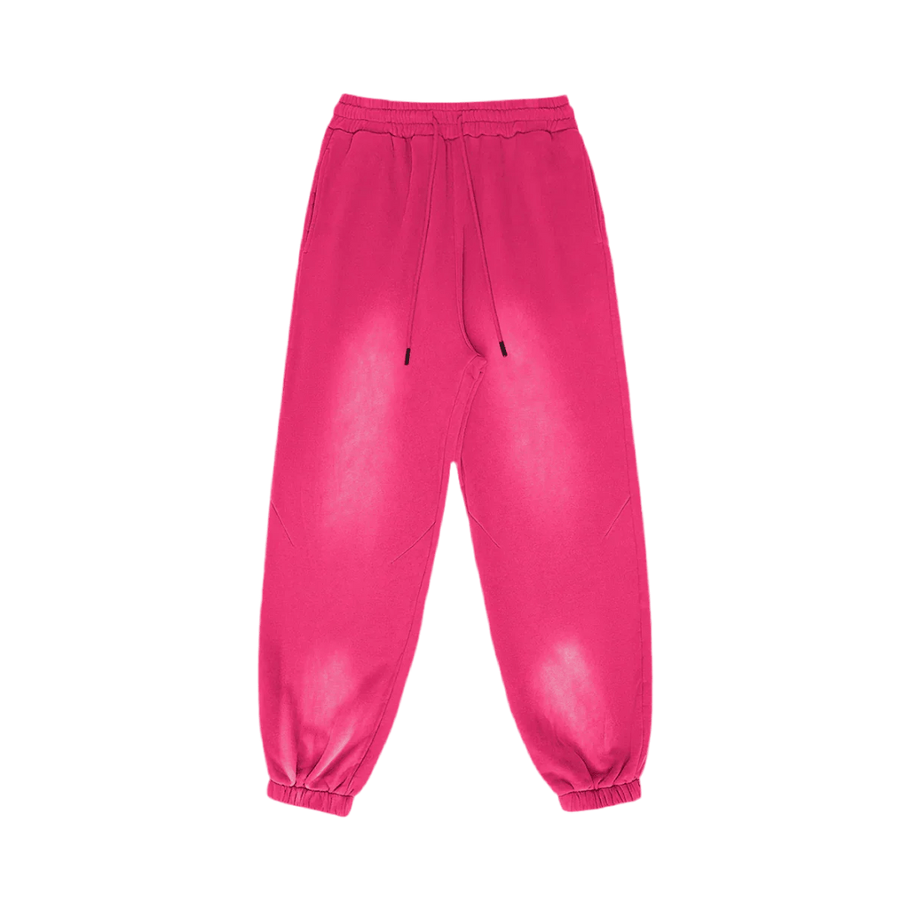 Bright pink sweatpants with an elastic waistband, drawstring, and cuffed ankles on a white background.